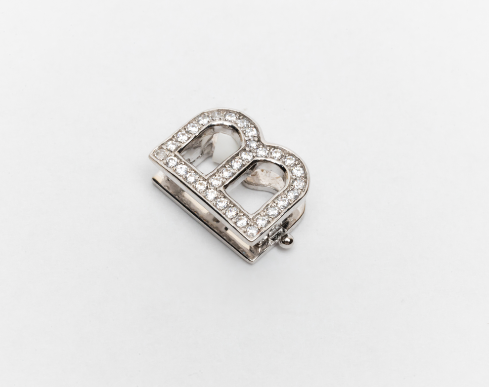 Inicial B plata zirconia