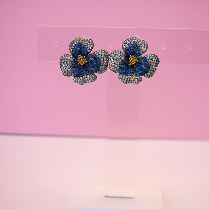 Aretes Flor Zirconia azul con plata