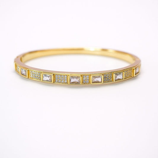 Pulsera de acero inoxidable con cristal y zirconias dorado