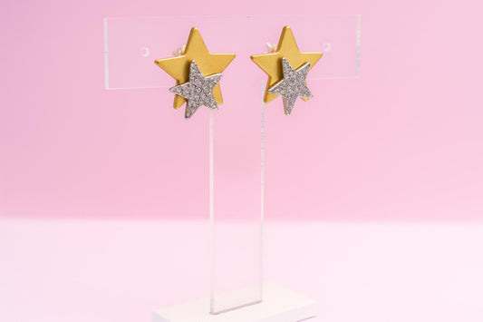 Aretes dorados con estrella plateada de zirconias