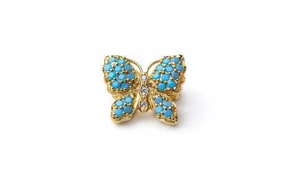 Mariposa azul turquesa  con dorado