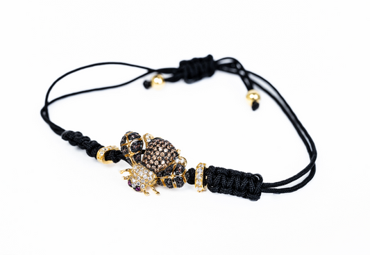 Pulsera de hilos con dije de abeja